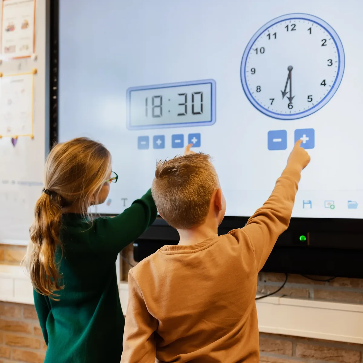 Children using clock tools